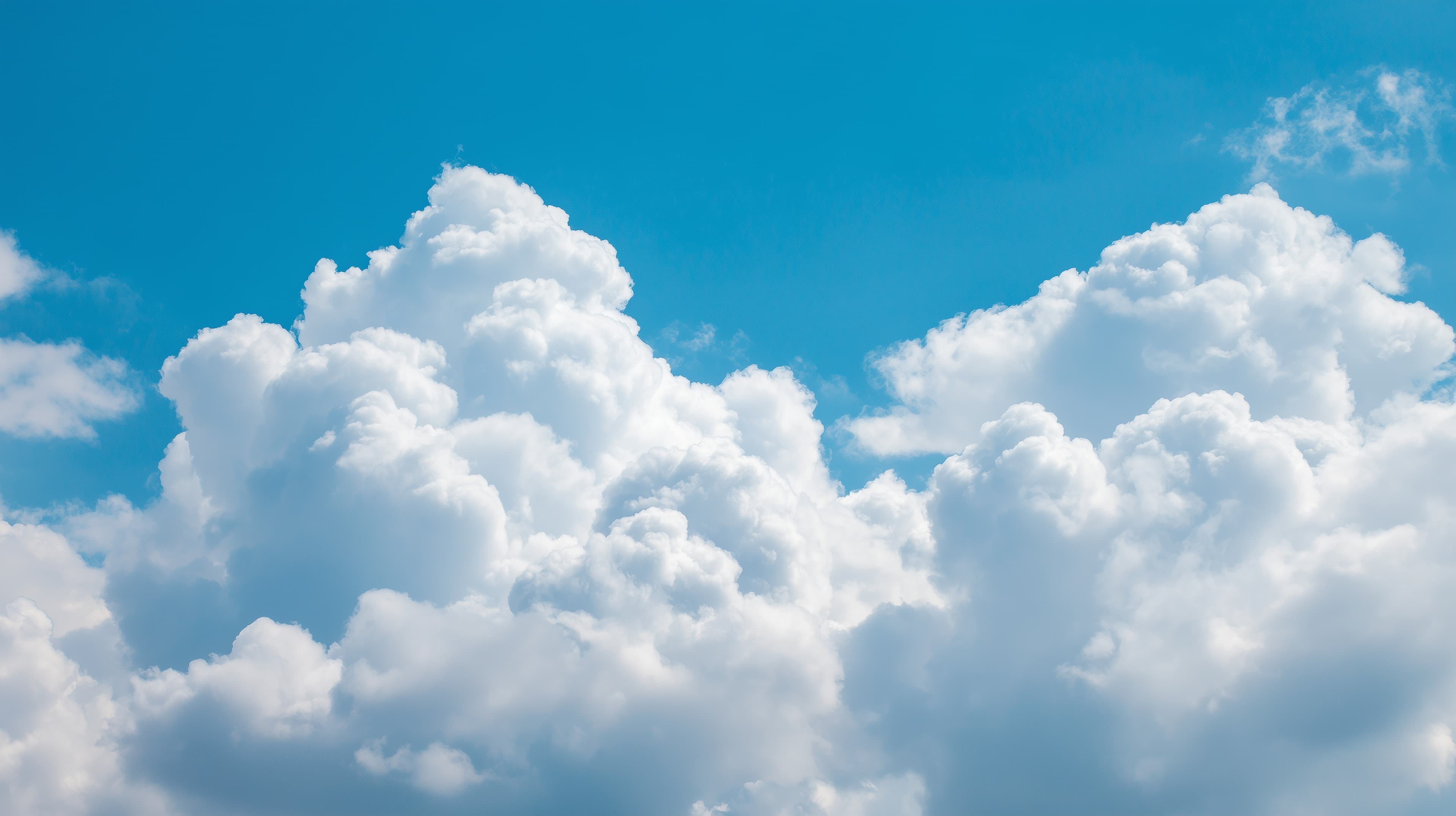 Serene blue sky with fluffy white cloud formations wallpaper - High Resolution clouds Wallpaper for Mobile and Desktop