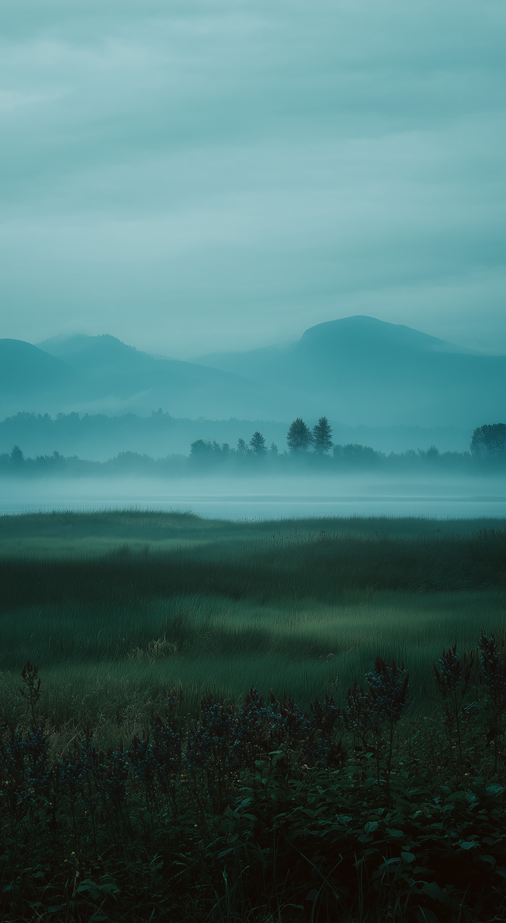 Misty Blue-Green Landscape: Serene Mountain Valley Scene at Dawn - High Resolution blue-green-scenery Wallpaper for Mobile and Desktop