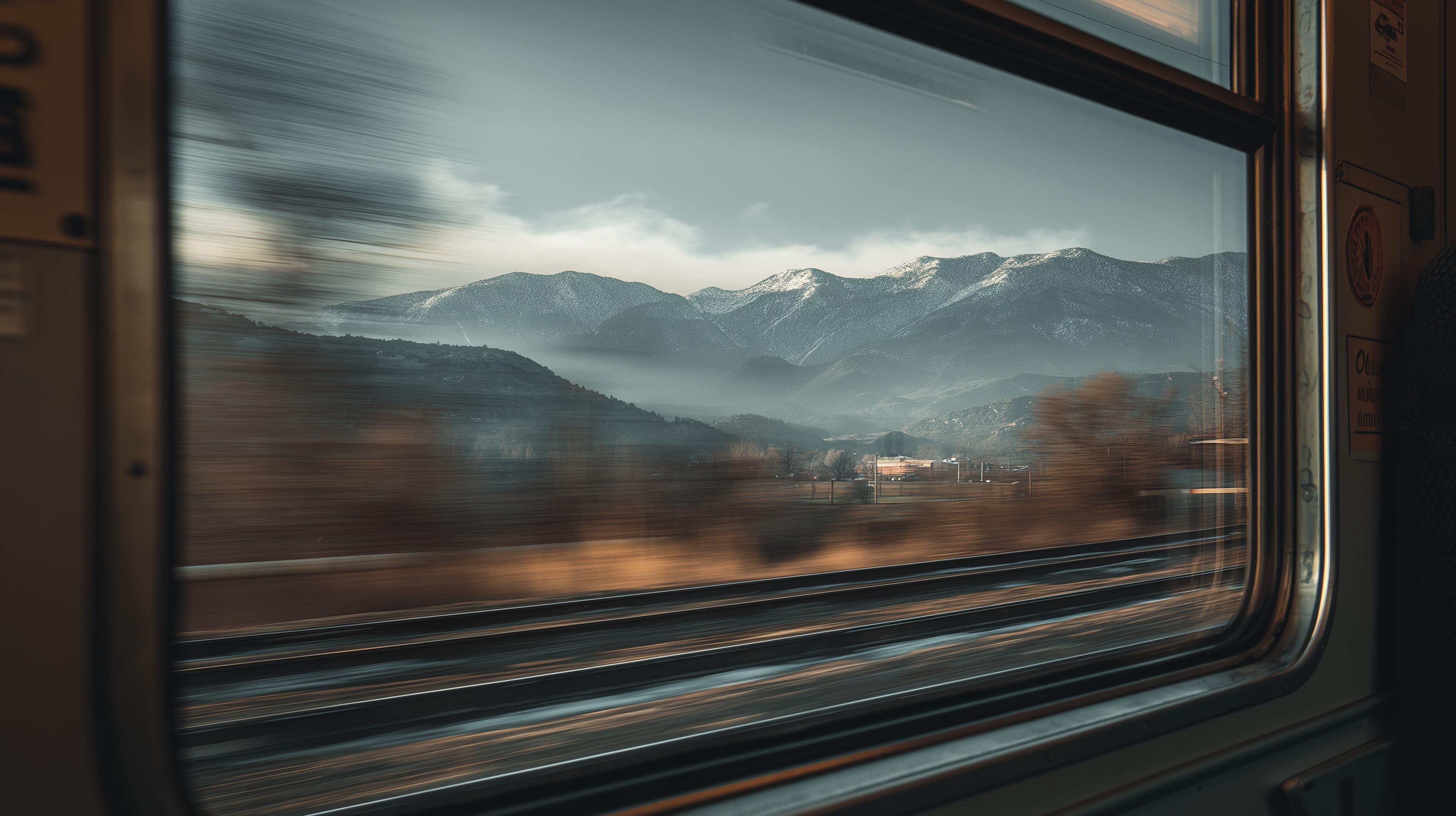 Motion Mountain Landscape: Serene Train Window Wallpaper - High Resolution blue-tones Wallpaper for Mobile and Desktop