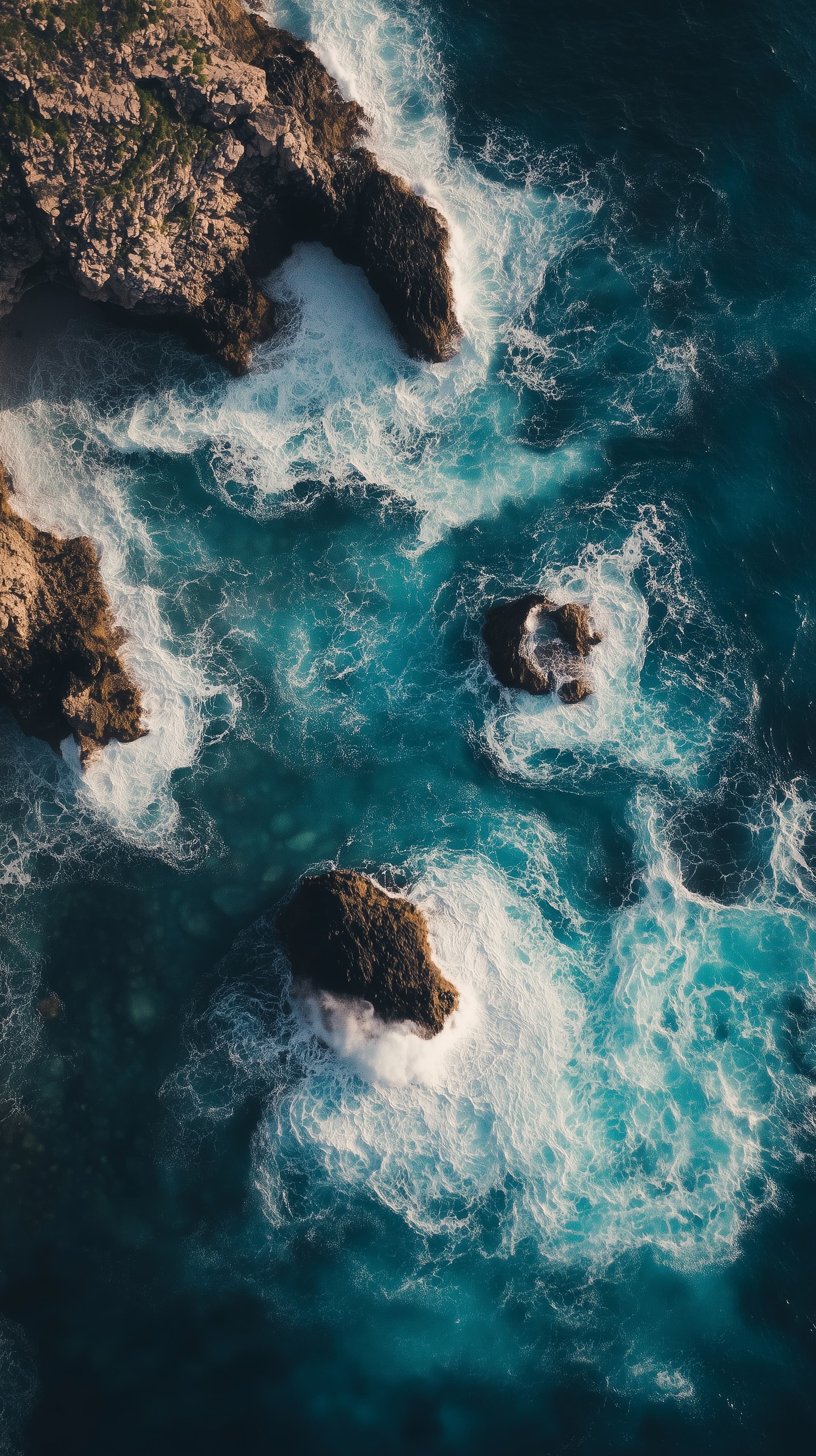 Aerial Coastal Seascape: Turquoise Waves and Rugged Rocks - High Resolution aerial-view Wallpaper for Mobile and Desktop
