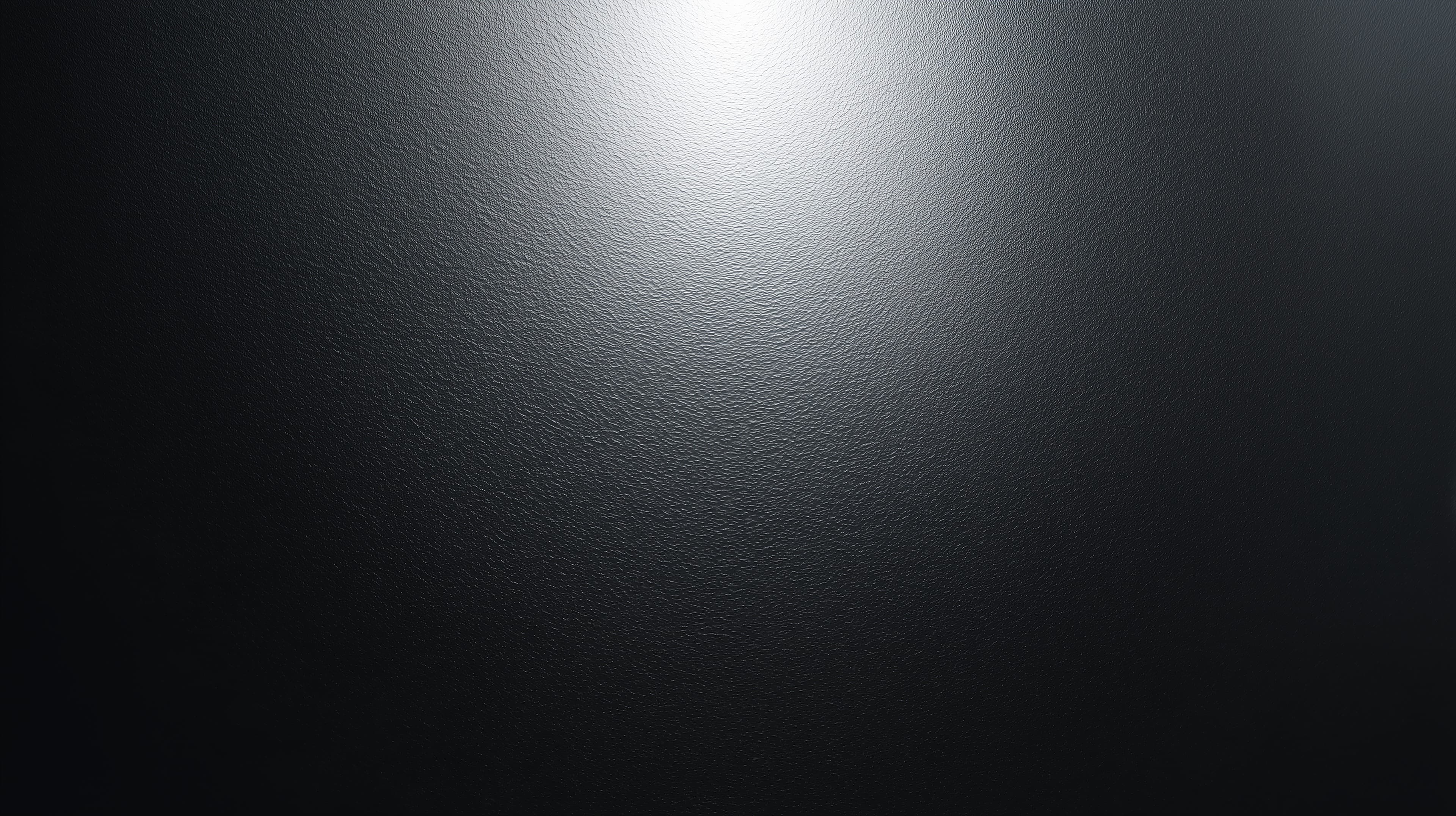 Dark Metallic Surface Texture with Soft Light Highlight - High Resolution dark-texture Wallpaper for Mobile and Desktop