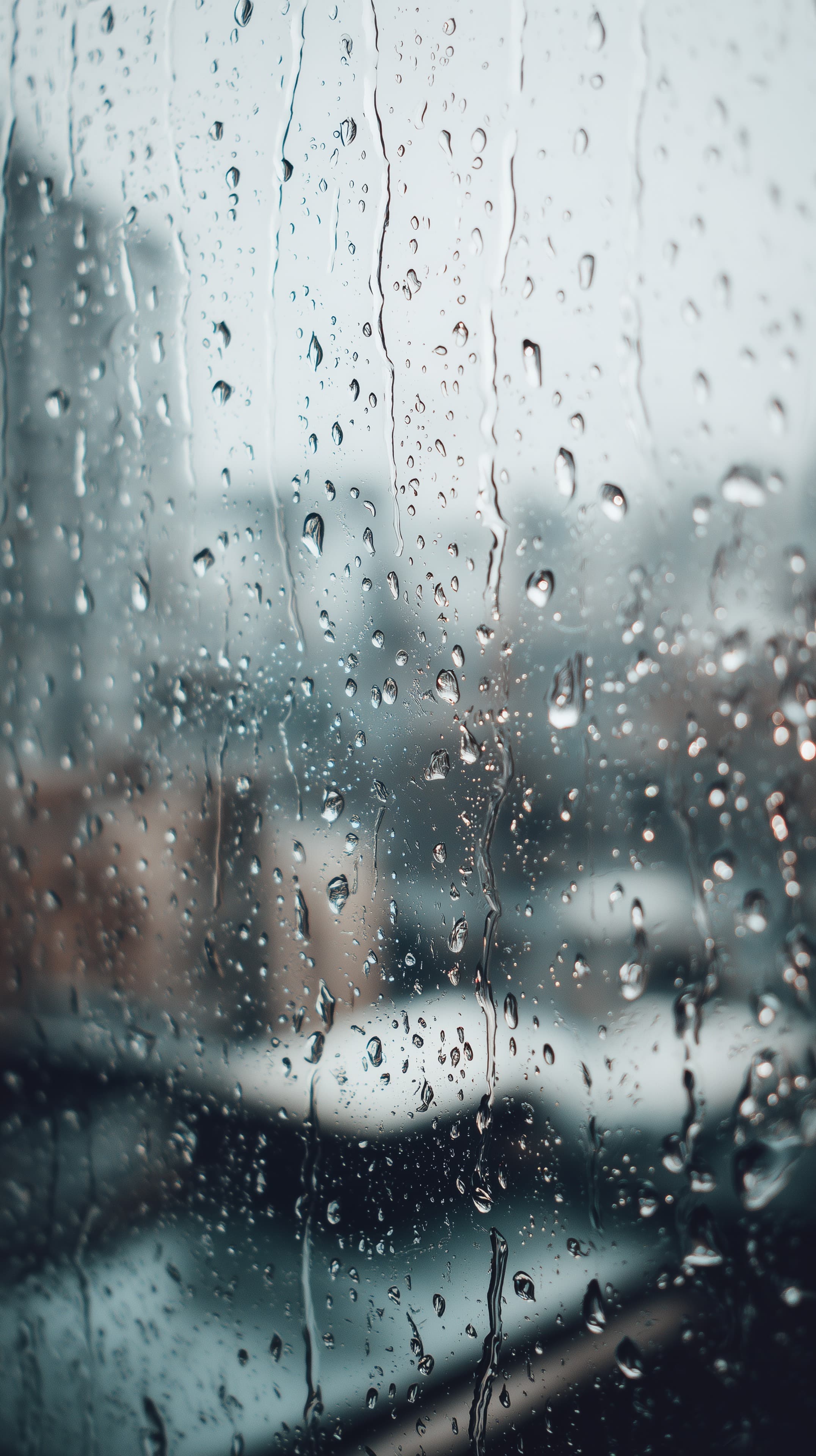Moody Rain on Glass Wallpaper with Water Droplets Texture - High Resolution background Wallpaper for Mobile and Desktop